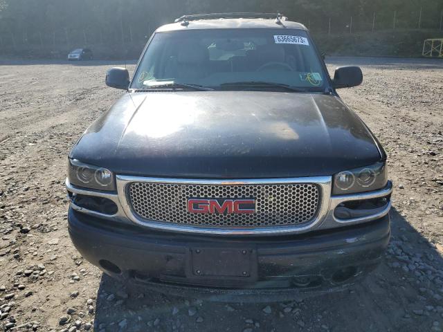 Photo 5 from auction – 2003 GMC YUKON with VIN 1GKEK63U73J246595