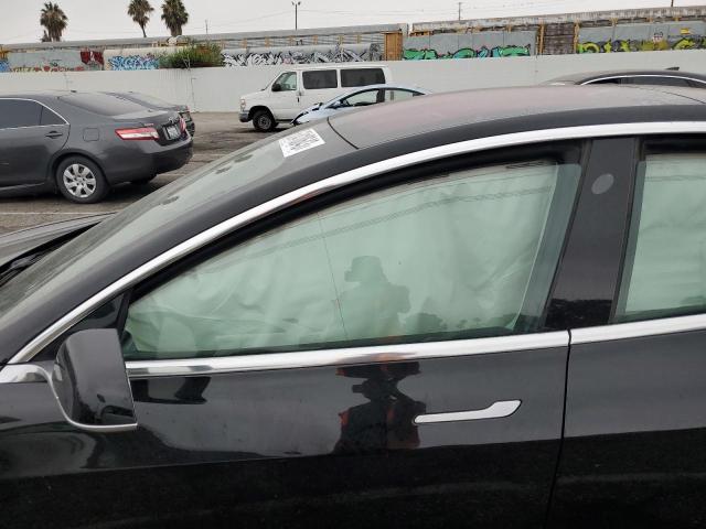 Photo 7 from auction – 2019 TESLA MODEL 3 with VIN 5YJ3E1EA6KF323737