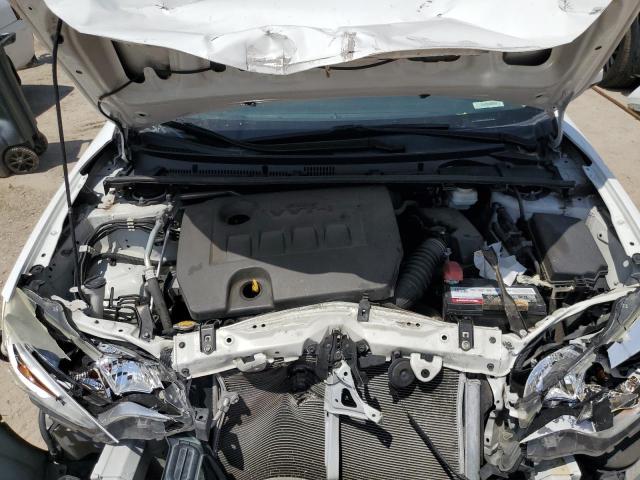 Photo 11 from auction – 2014 TOYOTA COROLLA L with VIN 5YFBURHE6EP066311
