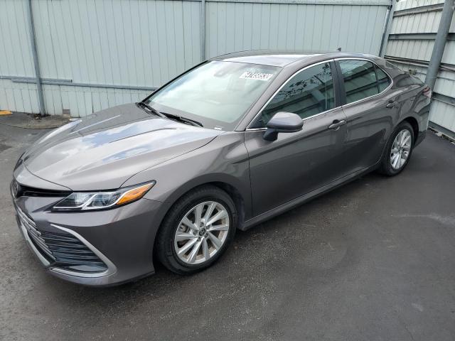 TOYOTA CAMRY LE 2022 with VIN 4T1C11AK5NU659543 - Photo from auction