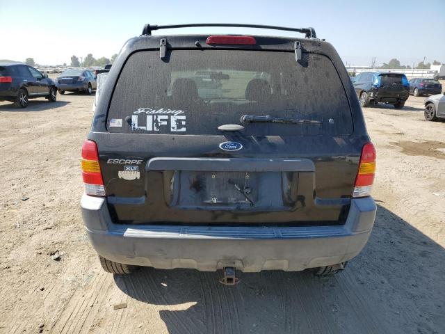 Photo 6 from auction – 2003 FORD ESCAPE XLT with VIN 1FMYU93103KB54891