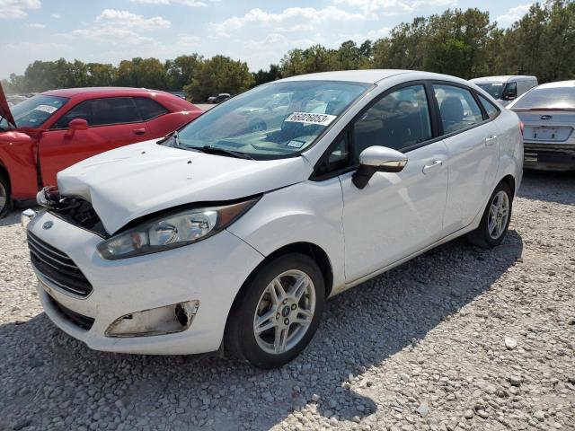 FORD FIESTA SE 2018 with VIN 3FADP4BJ9JM101696 - Photo from auction