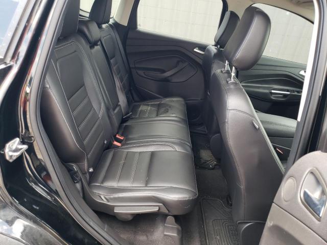 Photo 11 from auction – 2018 FORD ESCAPE TIT with VIN 1FMCU9J96JUA71664
