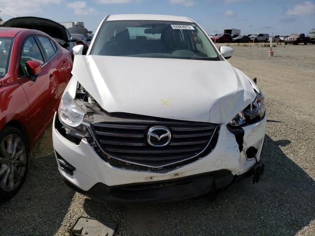 Photo 5 from auction – 2016 MAZDA CX-5 SPORT with VIN JM3KE2BY0G0900519