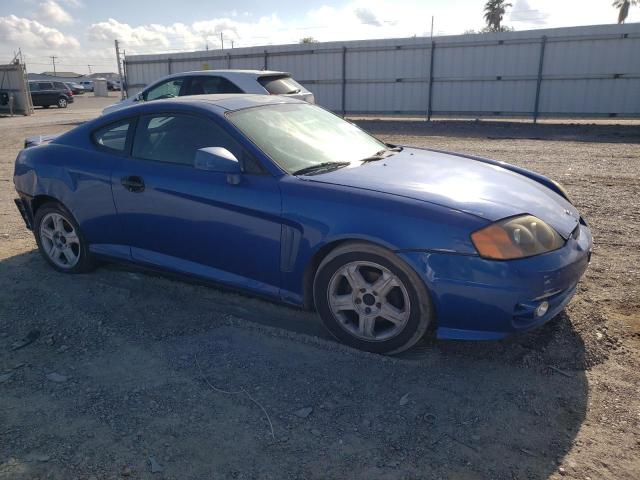 Photo 4 from auction – 2004 HYUNDAI TIBURON with VIN KMHHM65D34U107219