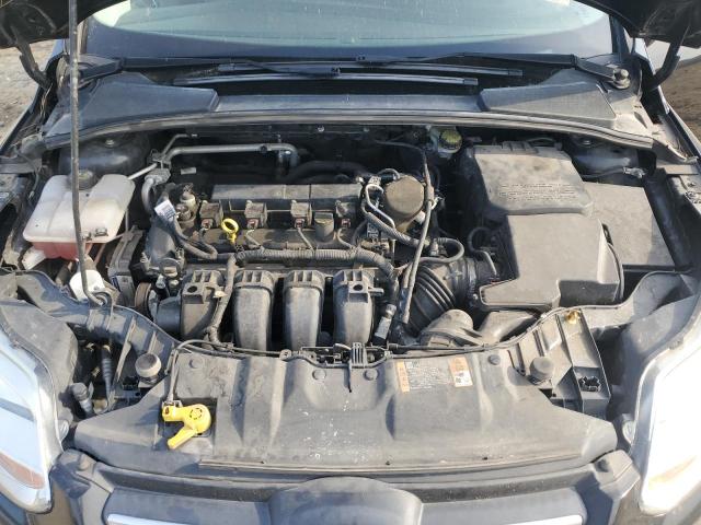 Photo 11 from auction – 2014 FORD FOCUS S with VIN 1FADP3F23EL391342