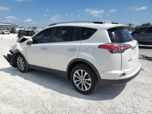 Photo 2 from auction – 2018 TOYOTA RAV4 LIMIT with VIN 2T3YFREV6JW444135
