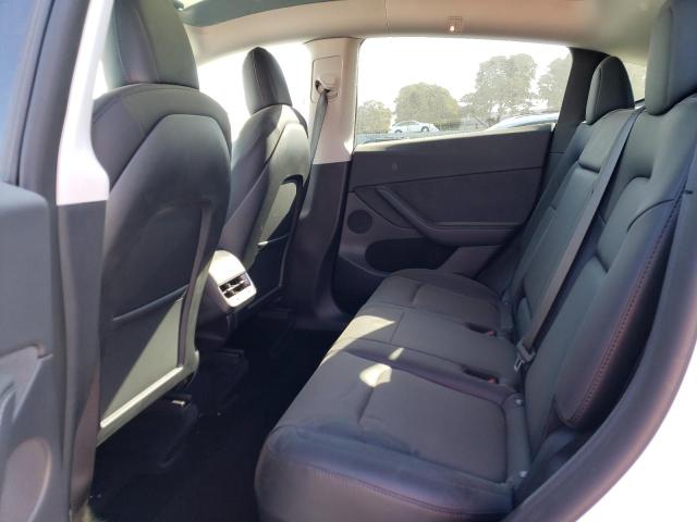 Photo 10 from auction – 2022 TESLA MODEL Y with VIN 7SAYGDEE9NF571833