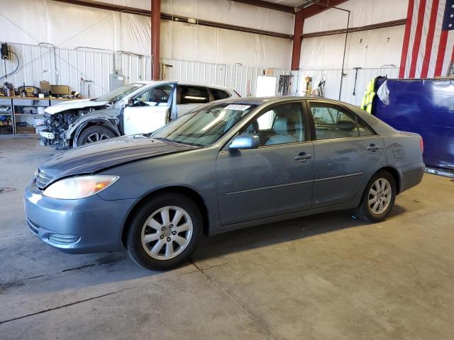 TOYOTA CAMRY LE 2002 with VIN 4T1BE32K92U587428 - Photo from auction