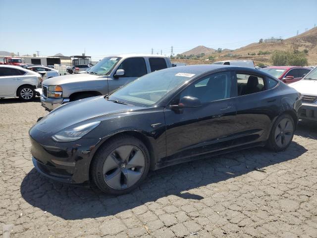 TESLA MODEL 3 2018 with VIN 5YJ3E1EA9JF012463 - Photo from auction