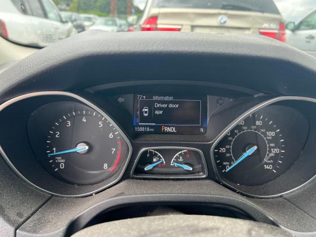 Photo 8 from auction – 2015 FORD FOCUS SE with VIN 1FADP3K22FL289960