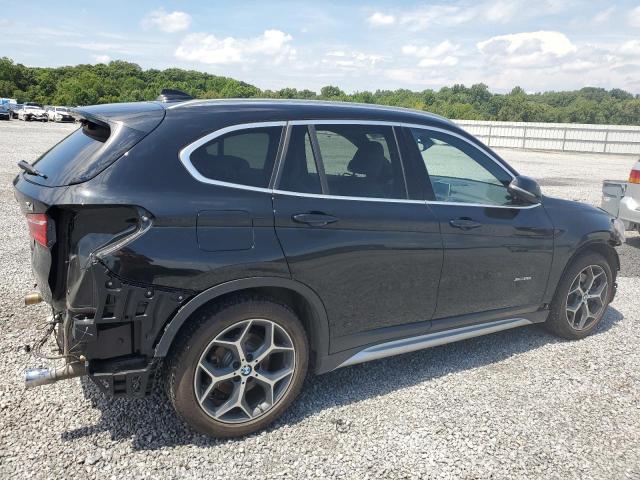 Photo 3 from auction – 2016 BMW X1 XDRIVE2 with VIN WBXHT3C33G5E50200