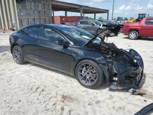 Снимка 4 от търг – 2021 TESLA MODEL 3 с VIN 5YJ3E1EA8MF090947