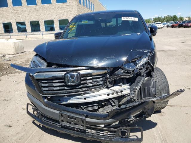 Photo 5 from auction – 2019 HONDA RIDGELINE with VIN 5FPYK3F84KB025510