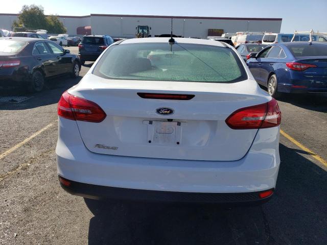 Foto 6 de la subasta – 2017 FORD FOCUS S con VIN 1FADP3E21HL344414