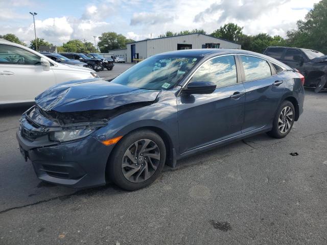 Photo 1 from auction – 2018 HONDA CIVIC EX with VIN 19XFC2F71JE017187