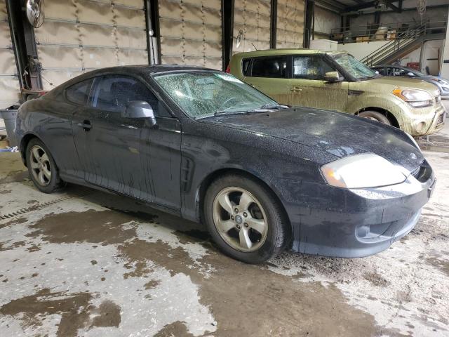 Photo 4 from auction – 2005 HYUNDAI TIBURON with VIN KMHHM65D55U161476