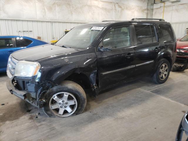 HONDA PILOT TOUR 2011 with VIN 5FNYF4H98BB103019 - Photo from auction