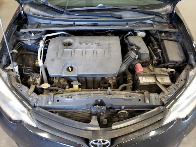 Photo 11 from auction – 2014 TOYOTA COROLLA L with VIN 2T1BURHEXEC020125