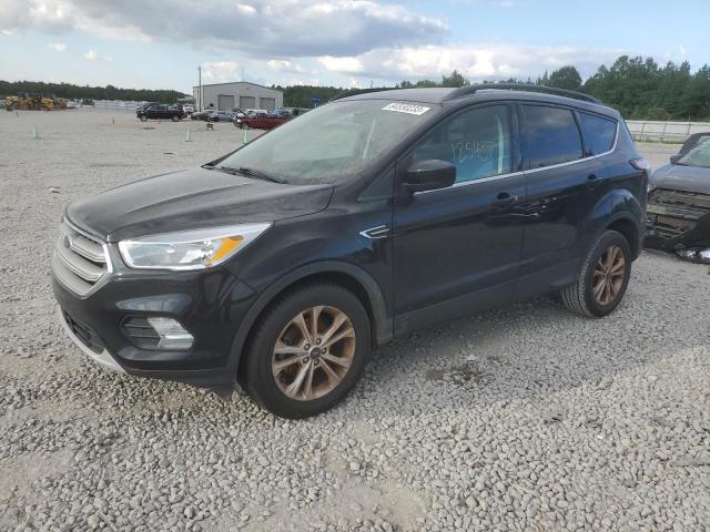 FORD ESCAPE SE 2018 with VIN 1FMCU0GD3JUC49277 - Photo from auction