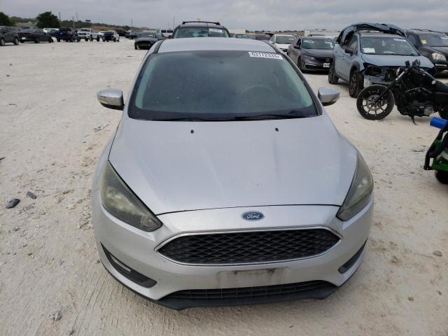 Снимка 5 от търг – 2015 FORD FOCUS SE с VIN 1FADP3K23FL283200
