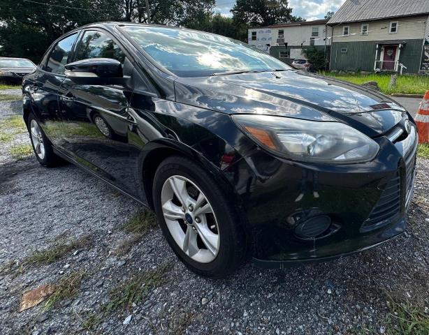 FORD FOCUS SE 2014 with VIN 1FADP3F25EL448401 - Photo from auction