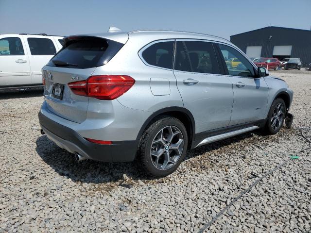 Photo 3 from auction – 2016 BMW X1 XDRIVE2 with VIN WBXHT3C3XG5E47231