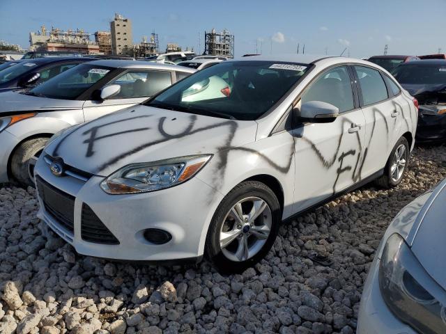 FORD FOCUS SE 2013 with VIN 1FADP3F27DL318389 - Photo from auction