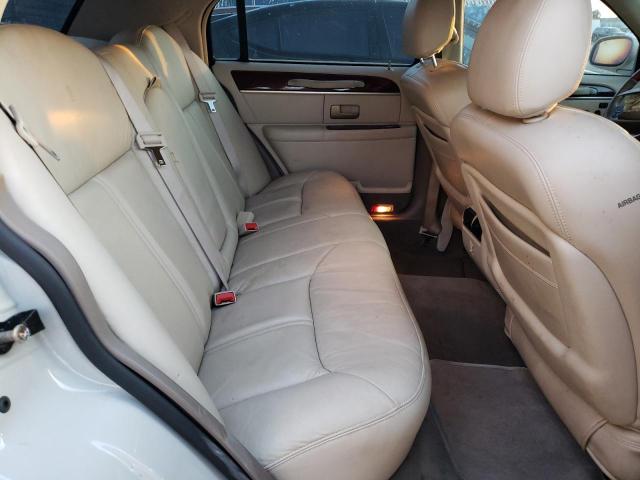 Photo 10 from auction – 2004 LINCOLN TOWN CAR U with VIN 1LNHM83W94Y640362