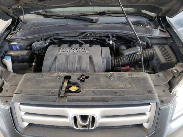 Photo 12 from auction – 2006 HONDA PILOT EX with VIN 5FNYF28576B024741