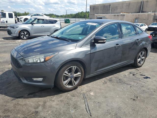 FORD FOCUS SE 2016 with VIN 1FADP3FE5GL350420 - Photo from auction