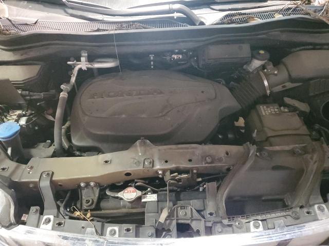 Photo 12 from auction – 2021 HONDA PILOT ELIT with VIN 5FNYF6H04MB059570