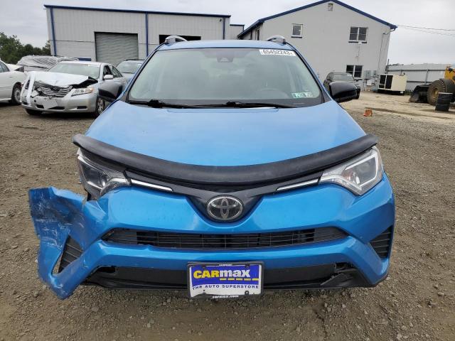 Photo 5 from auction – 2018 TOYOTA RAV4 LE with VIN 2T3BFREV7JW773836