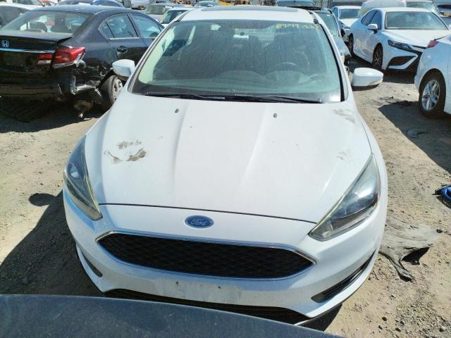 Photo 5 from auction – 2018 FORD FOCUS SEL with VIN 1FADP3H23JL304577