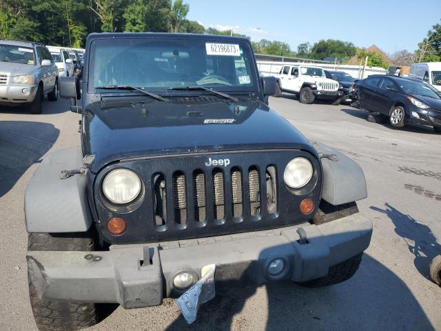 Photo 5 from auction – 2012 JEEP WRANGLER U with VIN 1C4BJWDG7CL209626