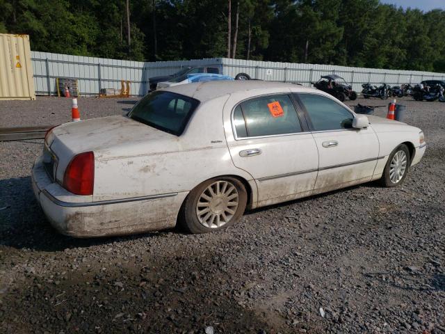 Photo 3 from auction – 2004 LINCOLN TOWNCAR with VIN 1LNHM81W54Y667223