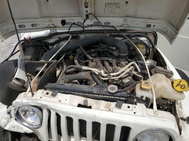Photo 11 from auction – 2004 JEEP WRANGLER X with VIN 1J4FA39S24P767756