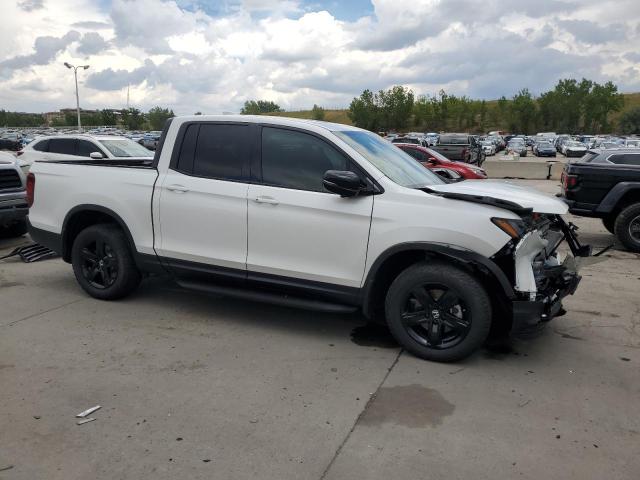 Photo 4 from auction – 2023 HONDA RIDGELINE with VIN 5FPYK3F80PB004791