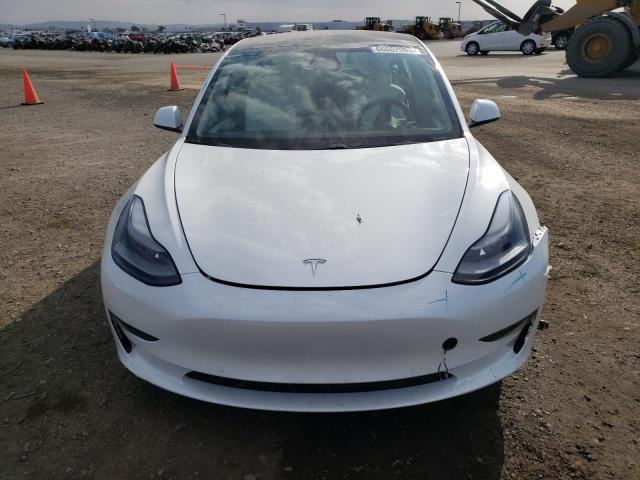Снимка 5 от търг – 2021 TESLA MODEL 3 с VIN 5YJ3E1EA7MF081754