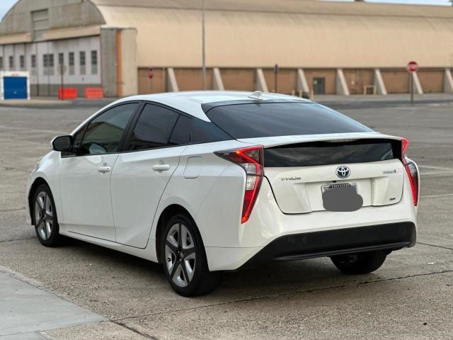 Photo 4 from auction – 2016 TOYOTA PRIUS with VIN JTDKARFU3G3023883