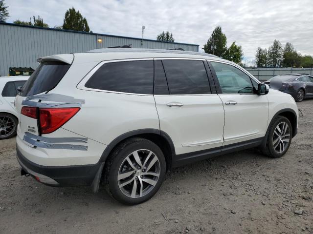 Photo 3 from auction – 2018 HONDA PILOT ELIT with VIN 5FNYF6H0XJB018940
