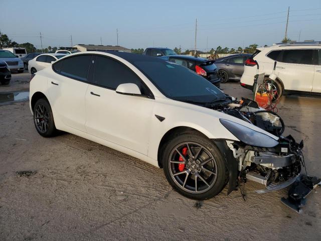 Photo 4 from auction – 2021 TESLA MODEL 3 with VIN 5YJ3E1EA5MF963652