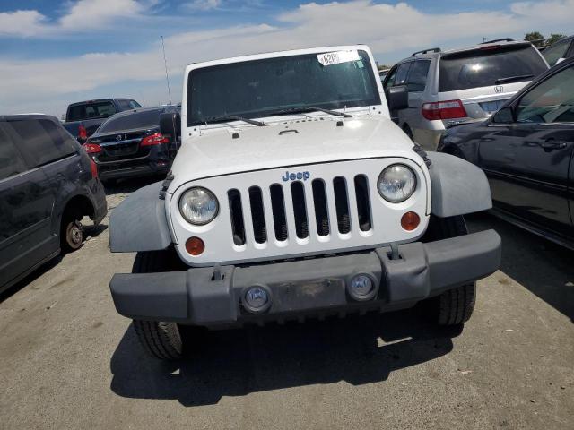 Photo 5 from auction – 2011 JEEP WRANGLER U with VIN 1J4BA3H15BL579101