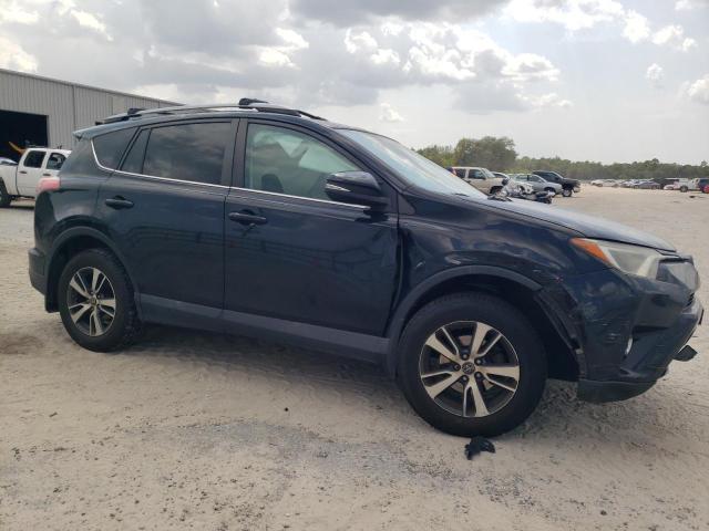 Photo 4 from auction – 2017 TOYOTA RAV4 XLE with VIN 2T3RFREV8HW574884