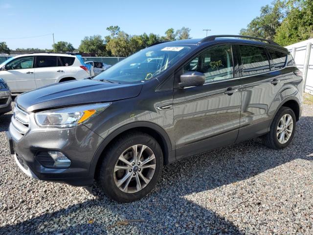 FORD ESCAPE SE 2018 with VIN 1FMCU0GD3JUC85292 - Photo from auction