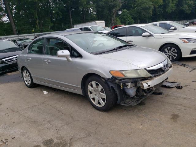 Photo 4 from auction – 2011 HONDA CIVIC LX with VIN 19XFA1F56BE010722