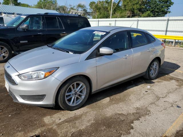 FORD FOCUS SE 2018 with VIN 1FADP3F2XJL230139 - Photo from auction