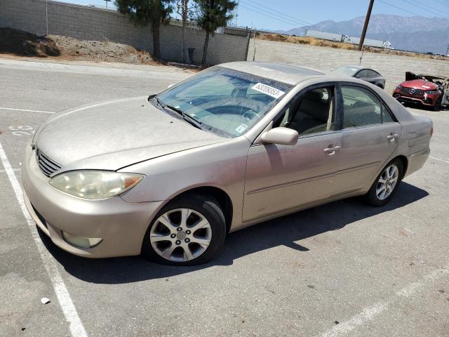 TOYOTA CAMRY LE 2005 with VIN 4T1BF30KX5U102248 - Photo from auction