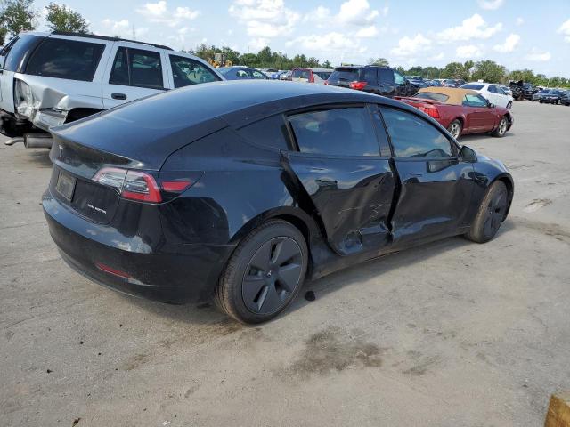 Снимка 3 от търг – 2021 TESLA MODEL 3 с VIN 5YJ3E1EBXMF848926