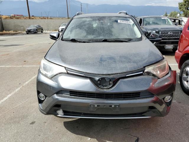 Photo 5 from auction – 2017 TOYOTA RAV4 XLE with VIN JTMWFREV6HD101694